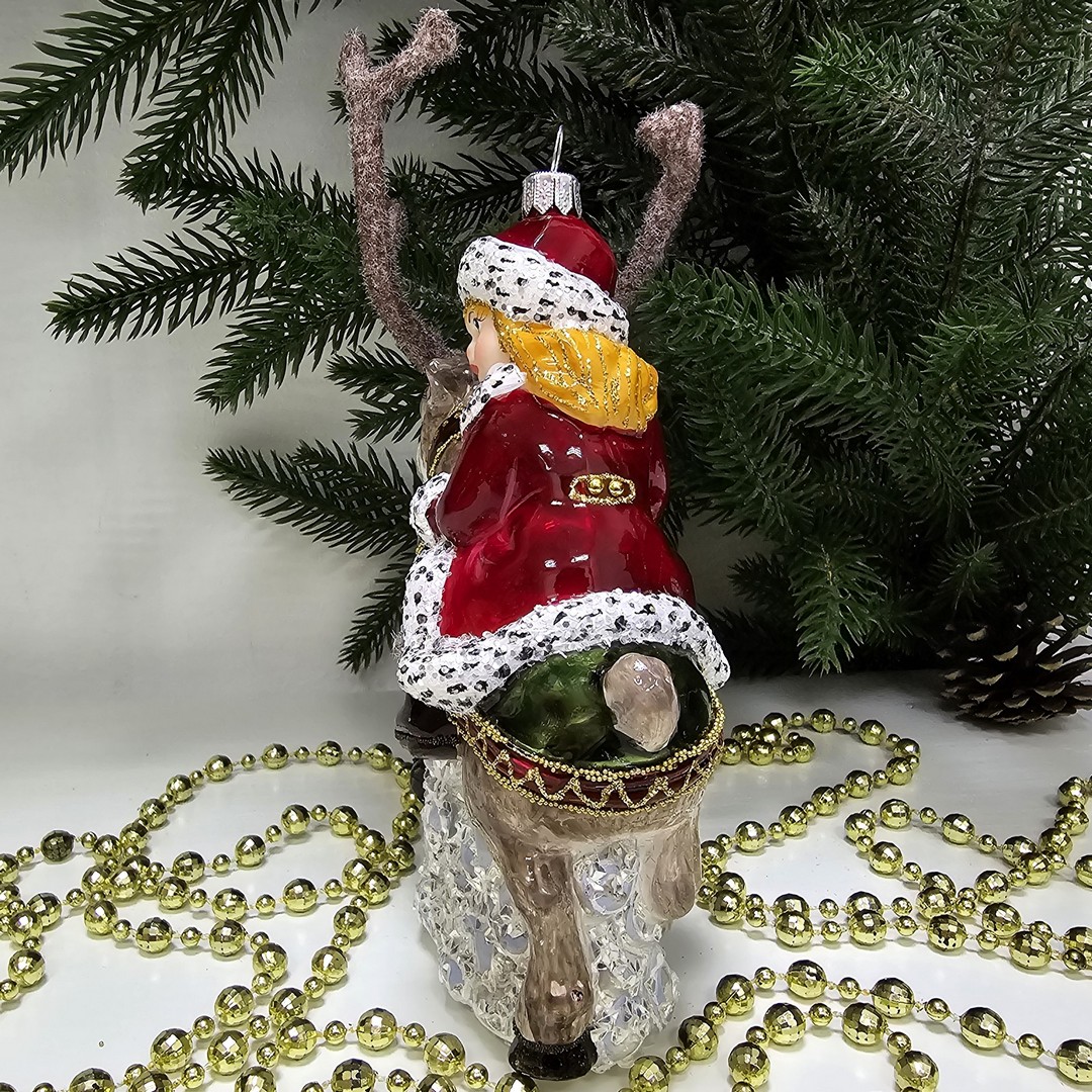 фото Стеклянная елочная игрушка Герда на олене