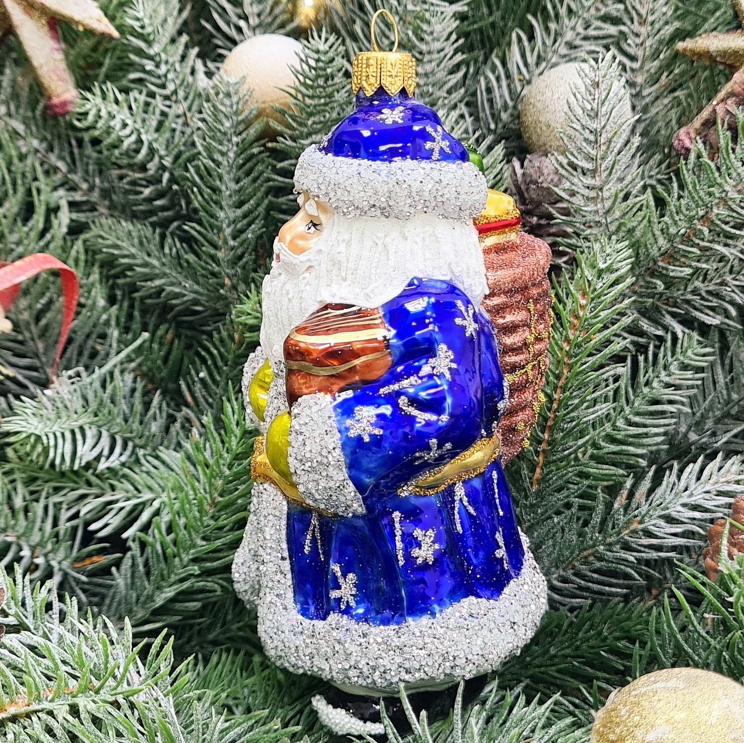 фото Стеклянная елочная игрушка Дед Мороз с подарками