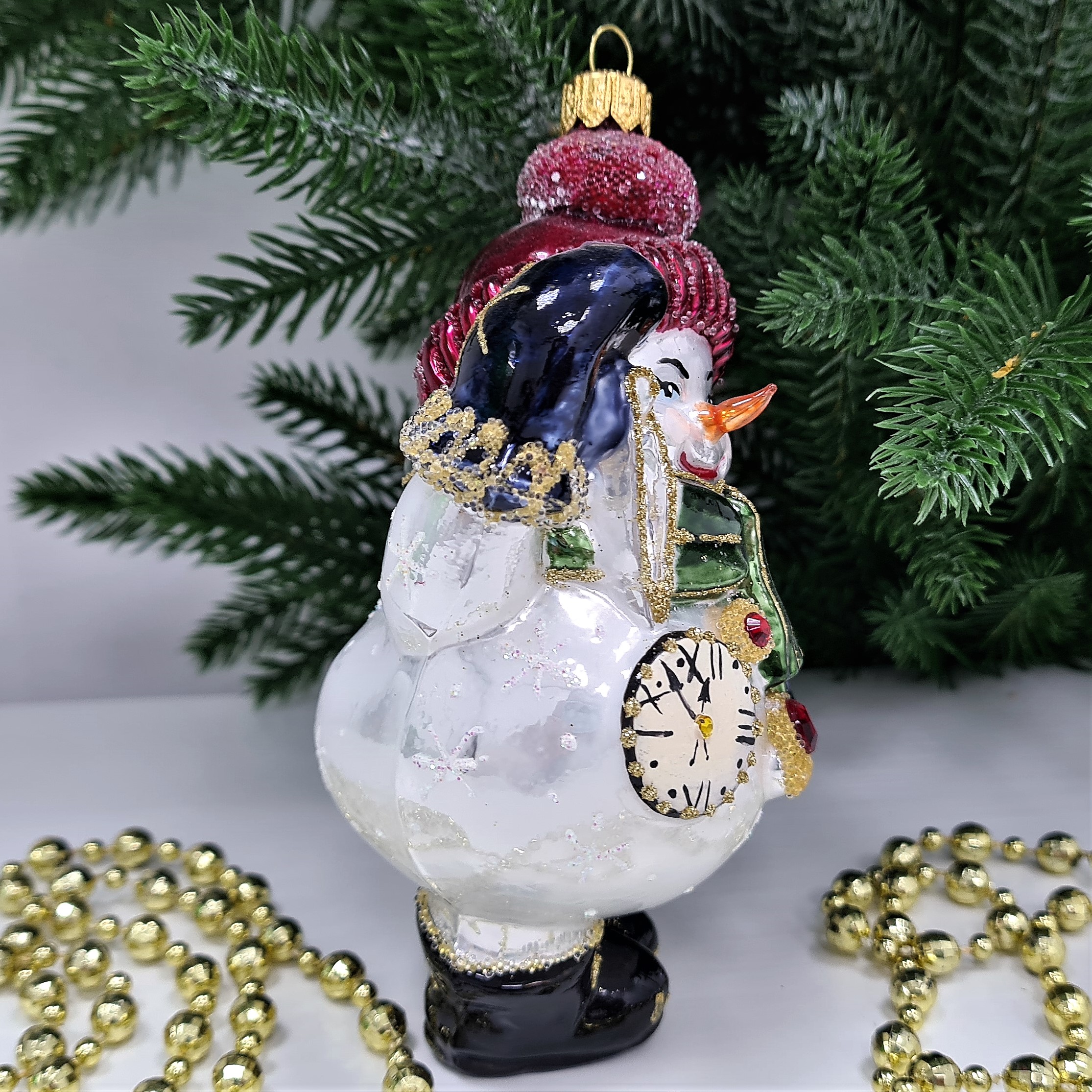 фото Стеклянная елочная игрушка Снеговик с часиками