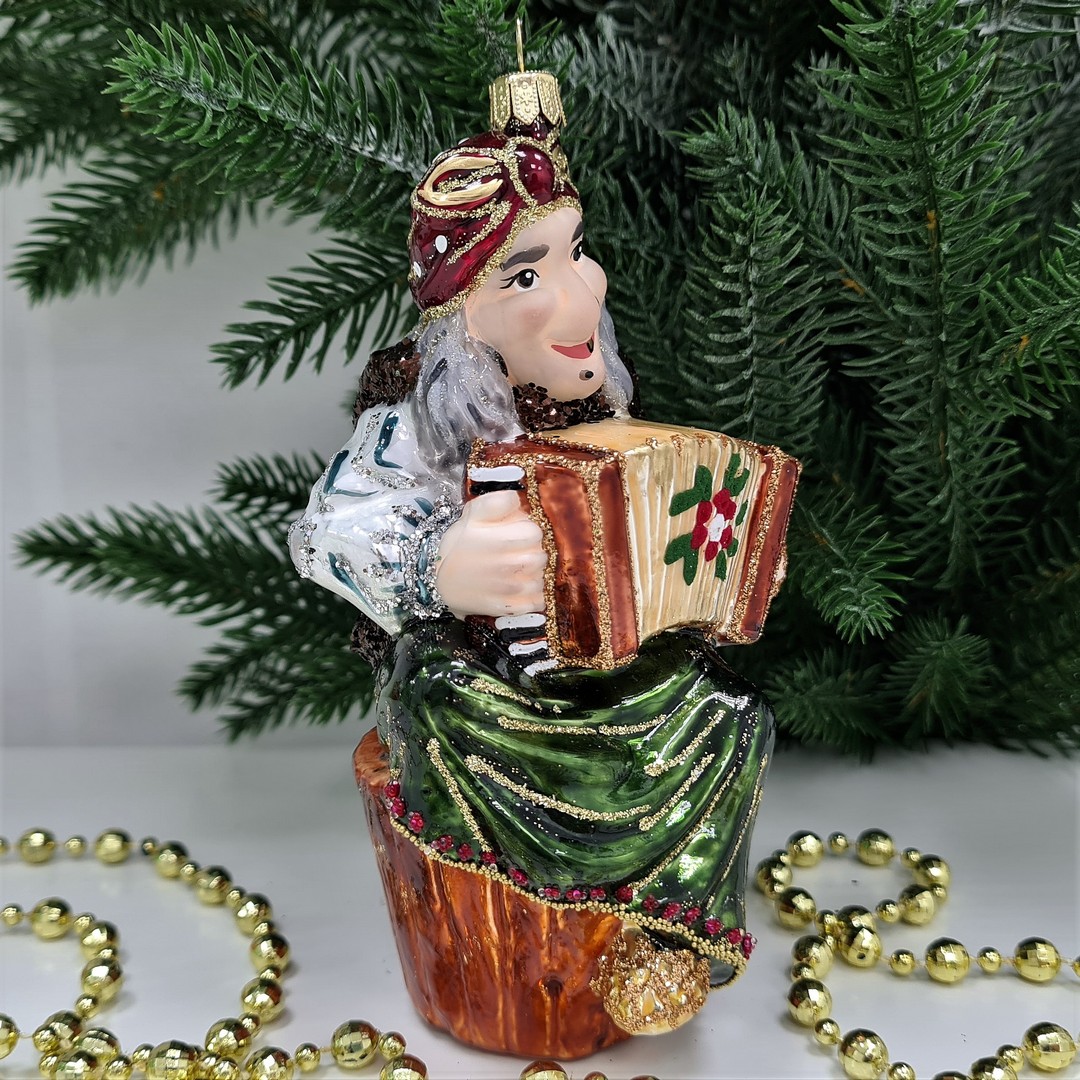 фото Стеклянная елочная игрушка Баба Яга с гармошкой