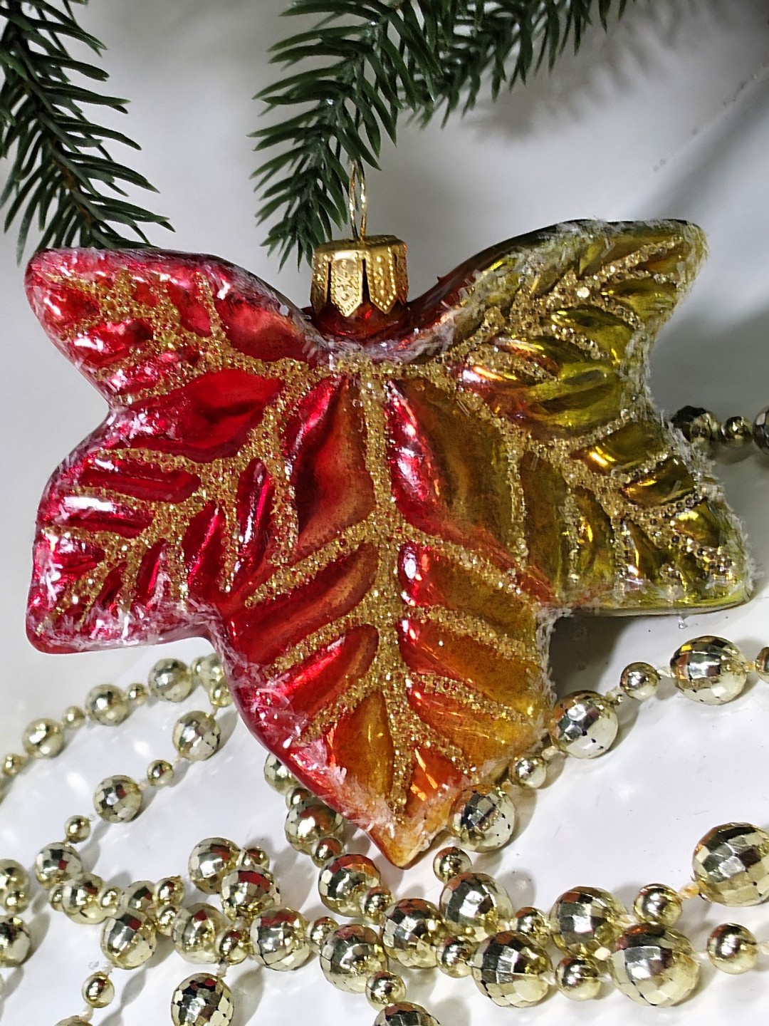 фото Стеклянная елочная игрушка Кленовый лист