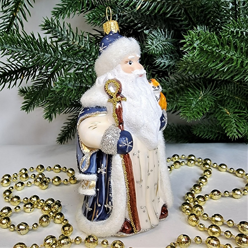 фото Стеклянная елочная игрушка Дед Мороз синий с белочкой