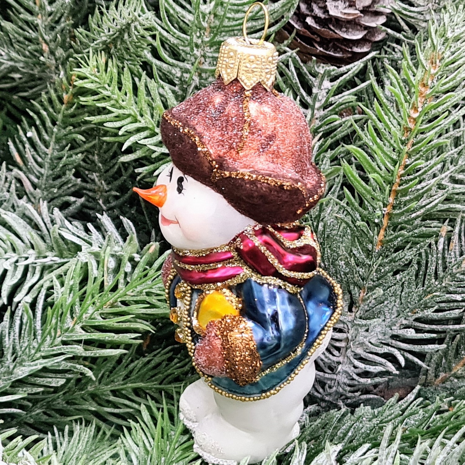 фото Стеклянная елочная игрушка Снеговик с колокольчиком крем