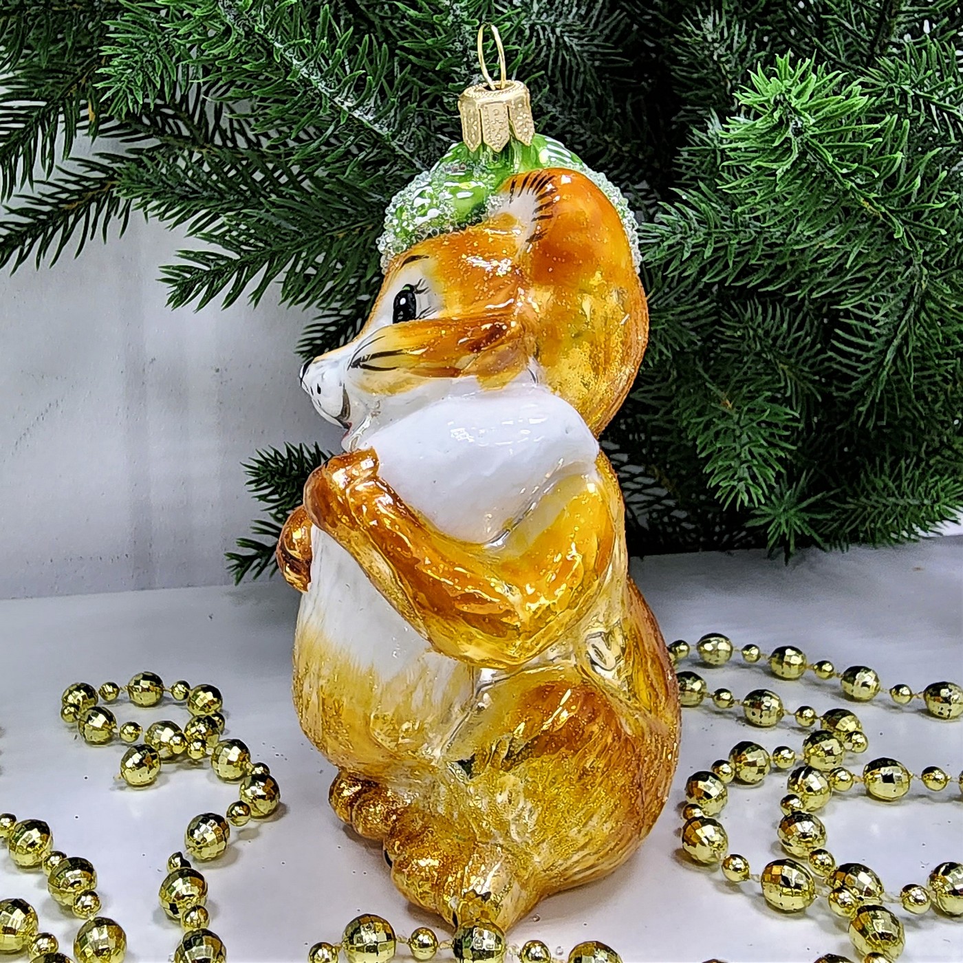 фото Стеклянная елочная игрушка Лисичка в шапке