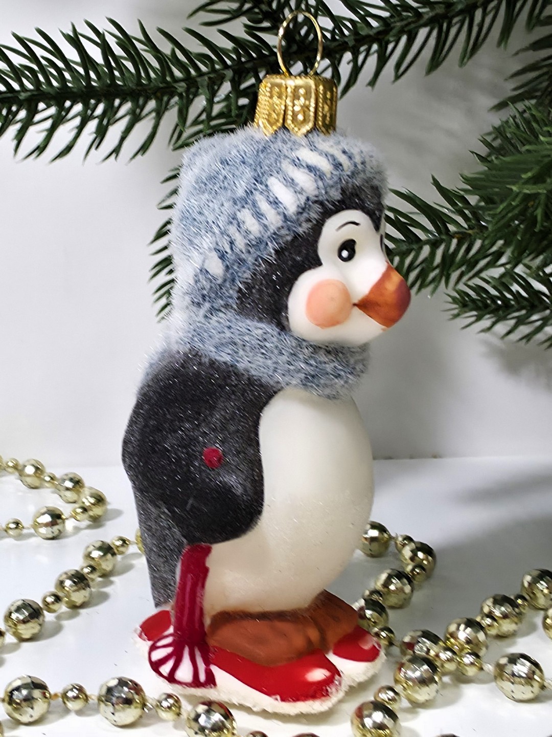 фото Стеклянная елочная игрушка Пингвин на лыжах