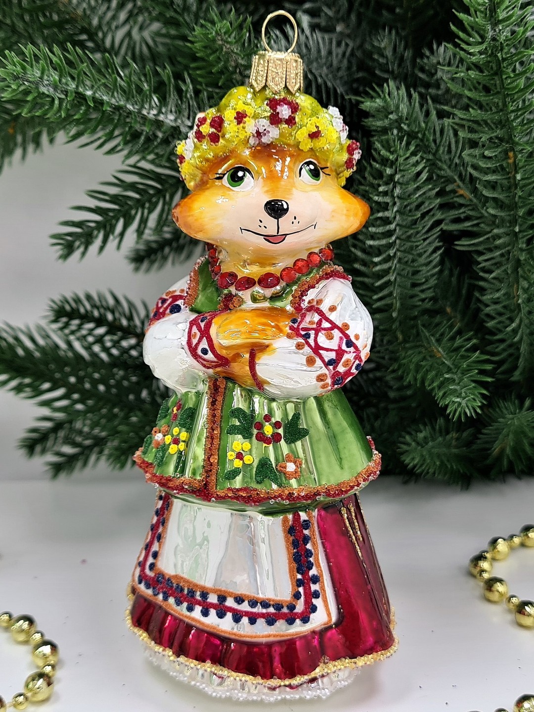 фото Стеклянная елочная игрушка Лиса в веночке