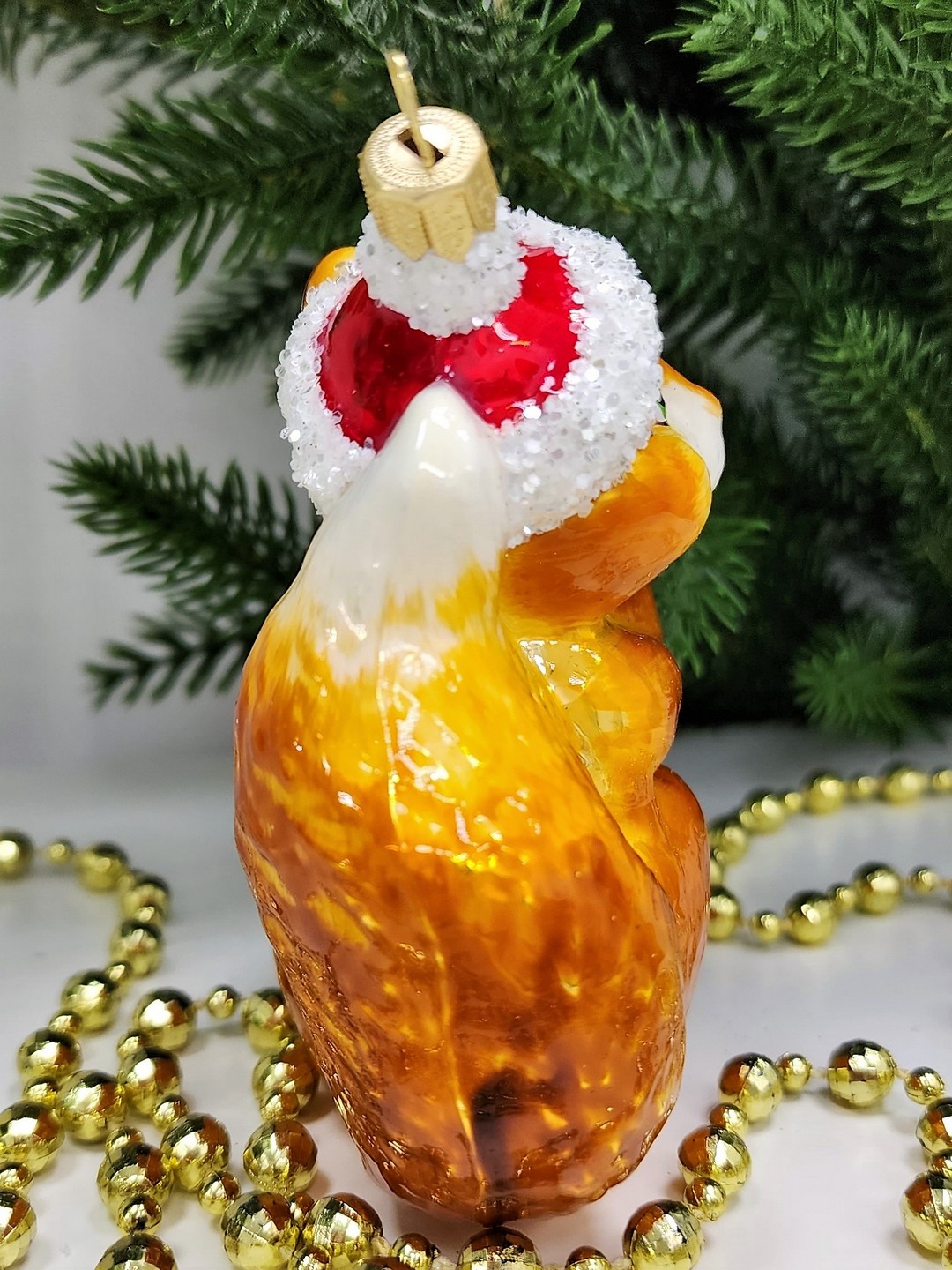 фото Стеклянная елочная игрушка Белочка с орехом