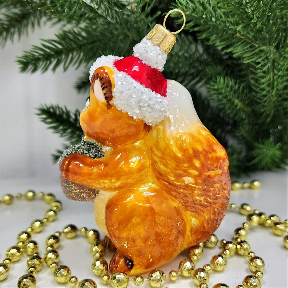 фото Стеклянная елочная игрушка Белочка с орехом