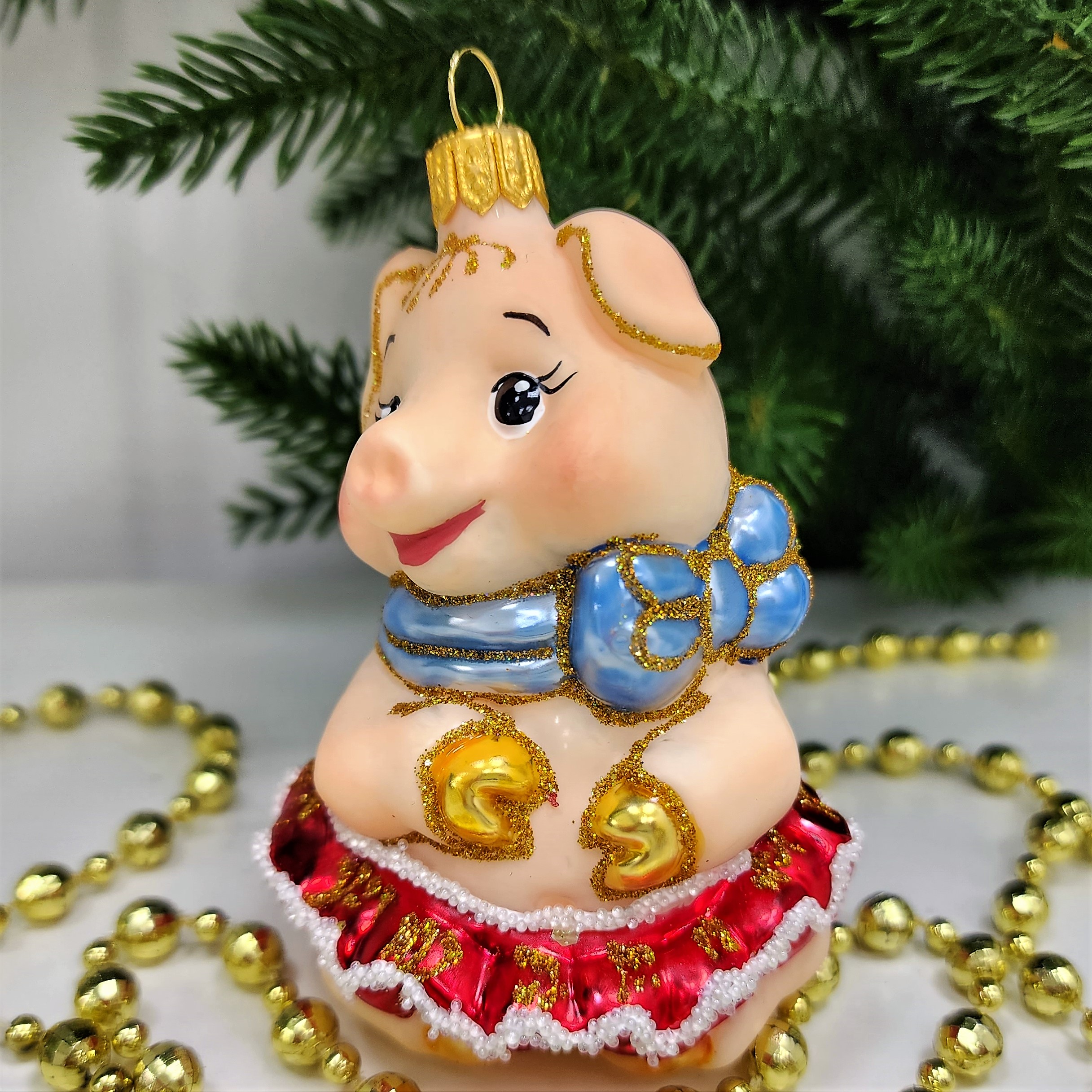 фото Стеклянная елочная игрушка Свинка девочка